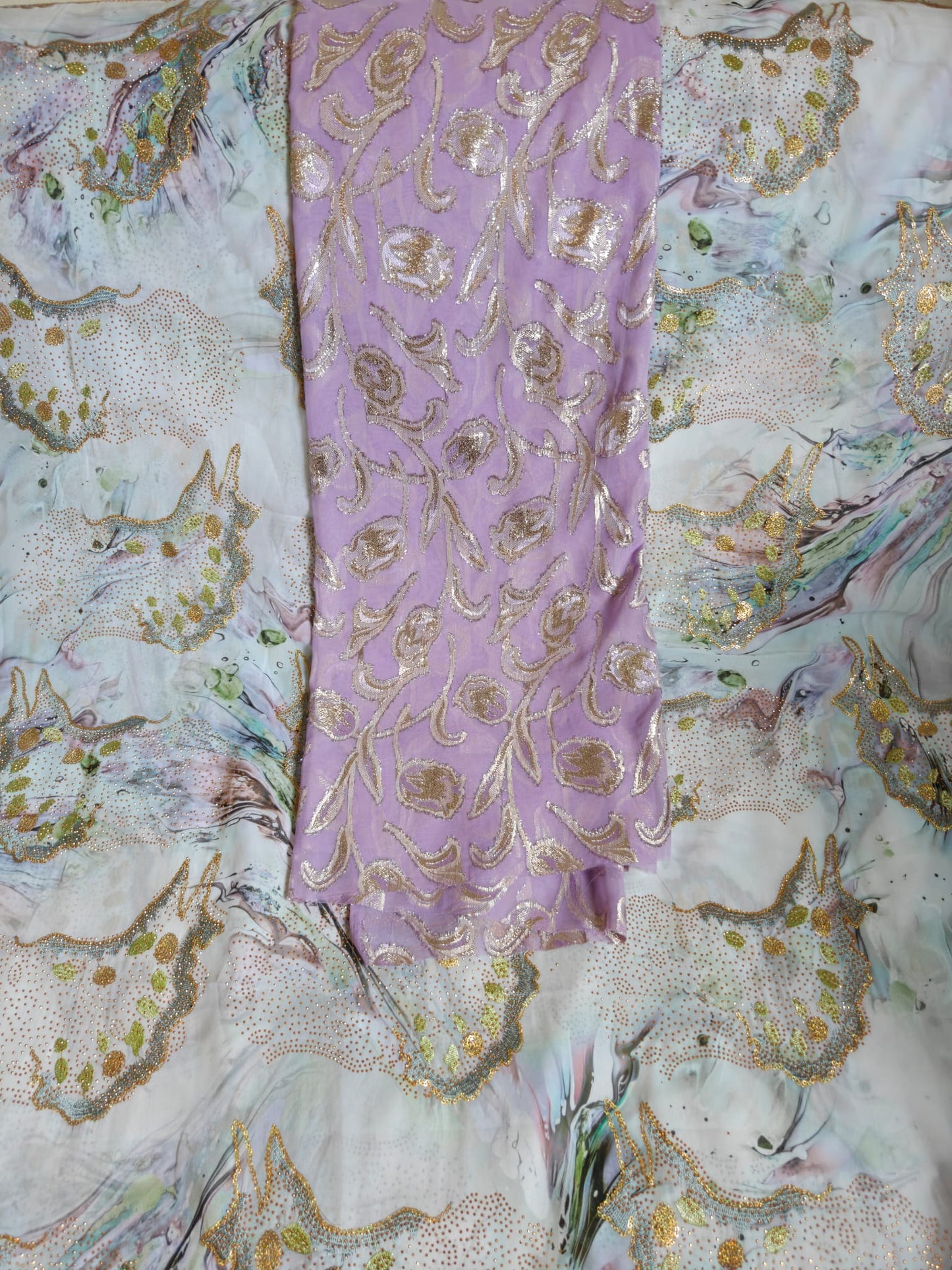 Soft lavender/lilac base with shimmering rose-gold and champagne metallic accents.
