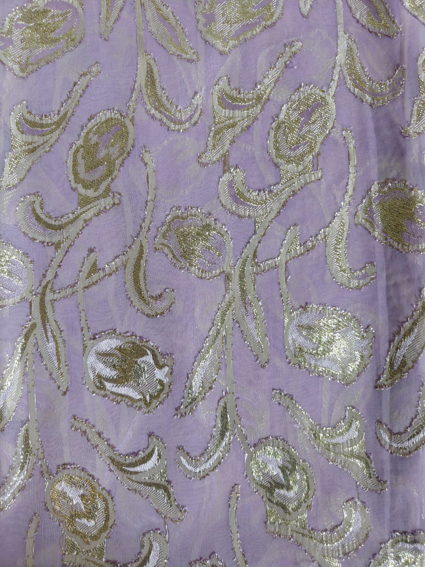 Soft lavender/lilac base with shimmering rose-gold and champagne metallic accents.